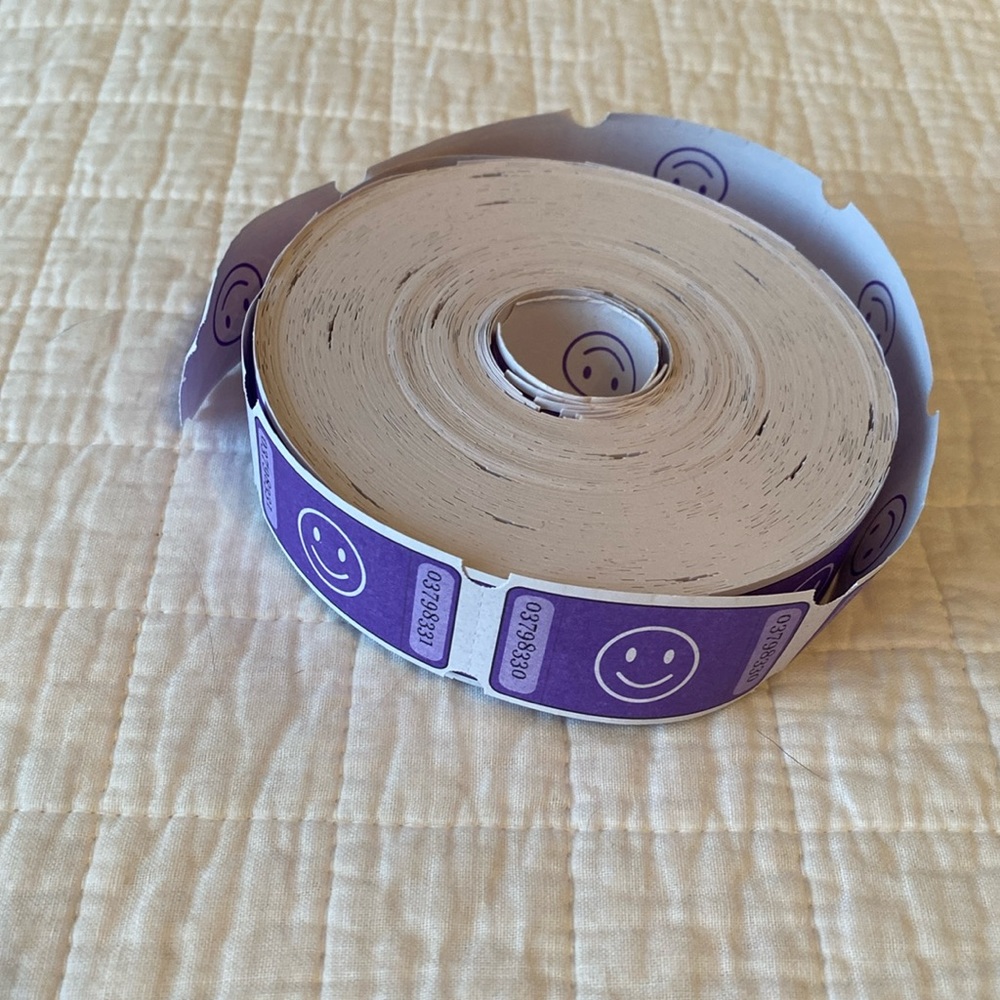 3/$20 Purple Smile Raffle Tickets Roll